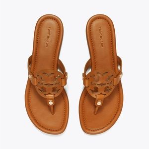 Tory Burch.  The original fit, our most narrow Miller.